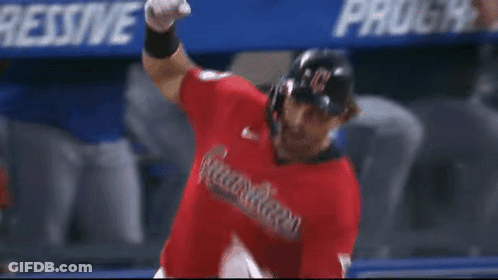 A Baseball Player Wearing A Red Guardians Jersey GIF