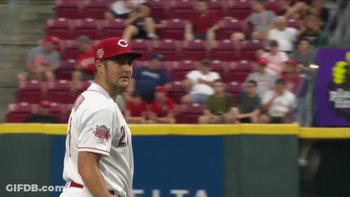 A Baseball Player Wearing A Red Hat With A C On It GIF