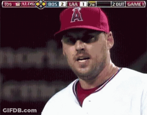 A Baseball Player Wearing A Red Hat With The Letter A On The Front GIF