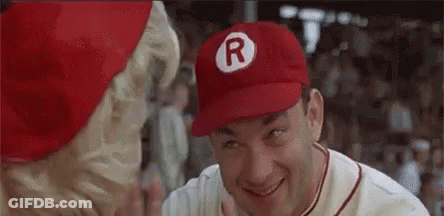 Baseball Player Talking To Another In Red Hat GIF