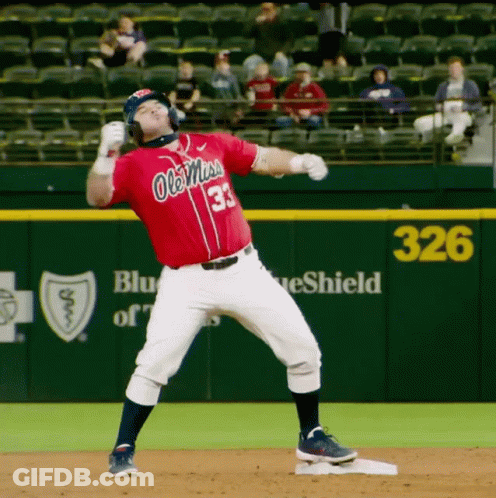 A Baseball Player Wearing A Red Jersey That Says Ole Miss On It GIF