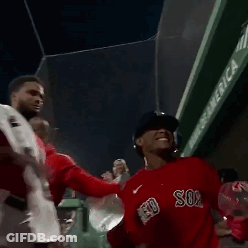 A Baseball Player Wearing A Red Jersey With The Letter R On The Front GIF