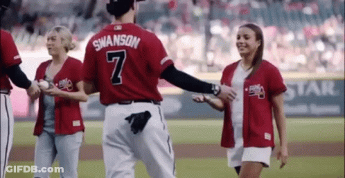 A Baseball Player Wearing A Red Jersey With The Number 7 On It GIF