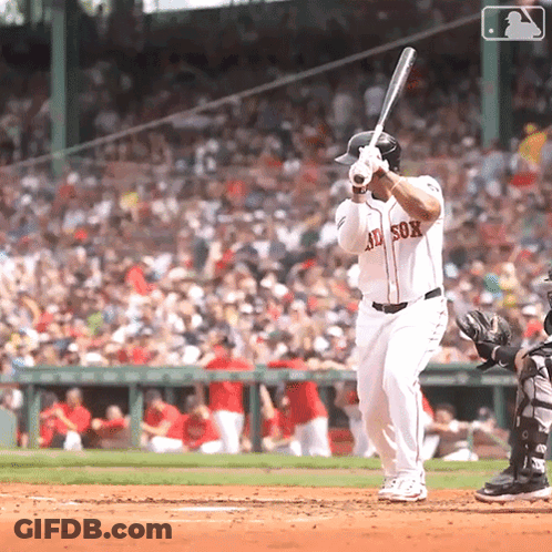 A Baseball Player Wearing A Red Sox Jersey Getting Ready To Bat GIF