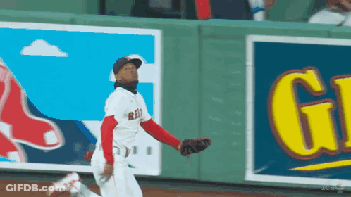 A Baseball Player Wearing A Red Sox Jersey Is Running GIF