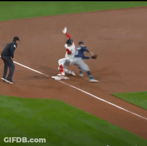 A Baseball Player Wearing A Red Sox Jersey Is Standing On The Field GIF
