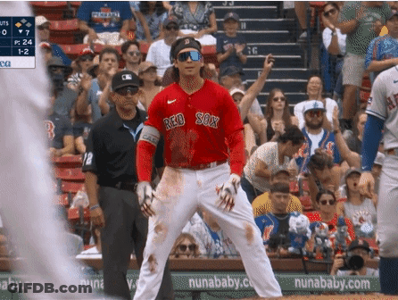 A Baseball Player Wearing A Red Sox Jersey Is Standing On The Field GIF