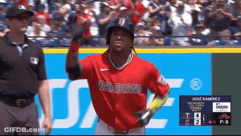A Baseball Player Wearing A Red Uniform That Says Guardians On It GIF
