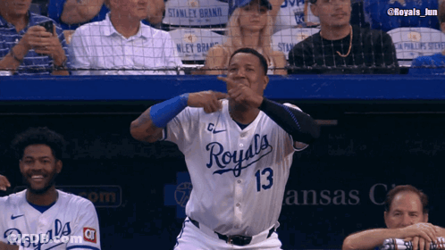 A Baseball Player Wearing A Royals Jersey Is Making A Funny Face GIF