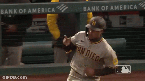 A Baseball Player Wearing A San Diego Uniform Is Running On A Baseball Field . GIF