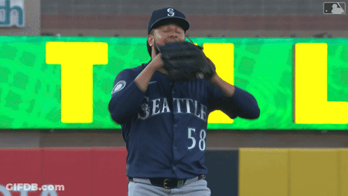 A Baseball Player Wearing A Seattle Jersey With The Number 58 GIF