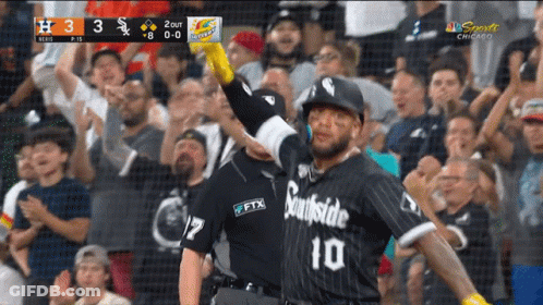 A Baseball Player Wearing A Southside 10 Jersey Stands In Front Of A Crowd GIF