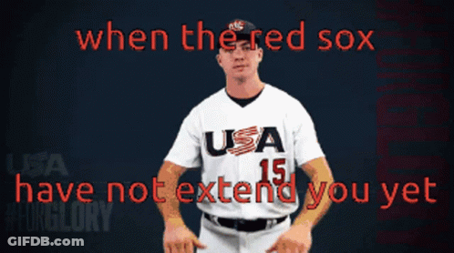 A Baseball Player Wearing A Usa 15 Jersey Stands In Front Of A Sign That Says When The Red Sox Have Not Extend You Yet GIF