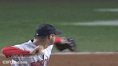 A Baseball Player Wearing A Wakefield Jersey Is Throwing A Ball . GIF