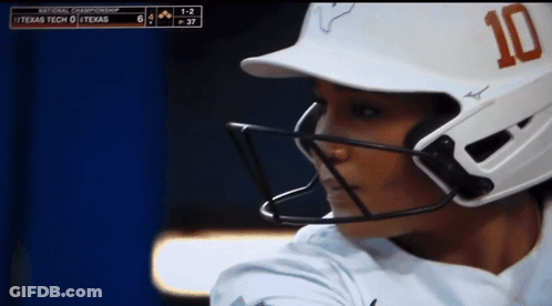 A Baseball Player Wearing A White Helmet With The Number 10 On It GIF