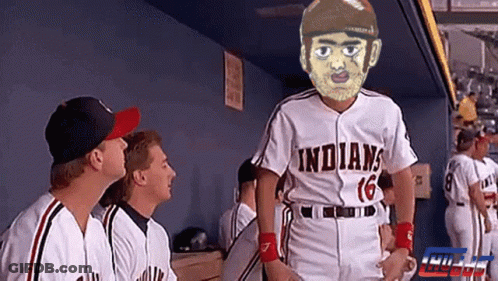 A Baseball Player Wearing A White Indians Jersey GIF