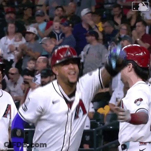 A Baseball Player Wearing A White Jersey With A Red A On The Front GIF