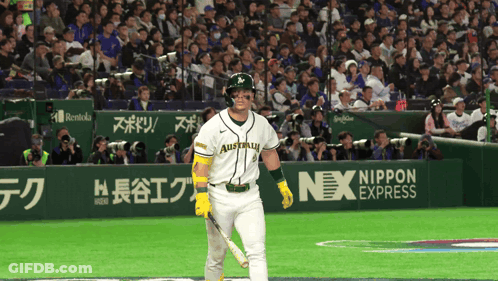 A Baseball Player Wearing A White Jersey With Australia On It GIF