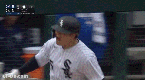 A Baseball Player Wearing A White Sox Jersey Is Running GIF