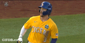 A Baseball Player Wearing A Yellow Tigers Jersey GIF