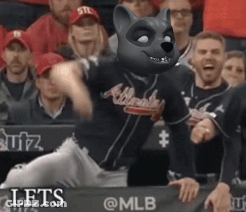 A Baseball Player Wearing An Atlanta Braves Jersey With A Raccoon Mask On His Face GIF