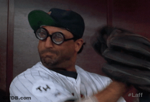 A Baseball Player Wearing Glasses And A Hat With The Number 14 On The Back GIF