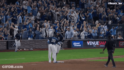 A Baseball Player Wearing Number 39 Runs Towards The Base GIF