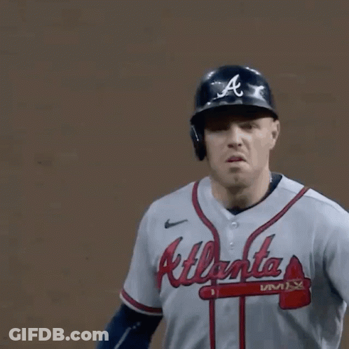 A Baseball Player With A Jersey That Says Atlanta Braves On It GIF