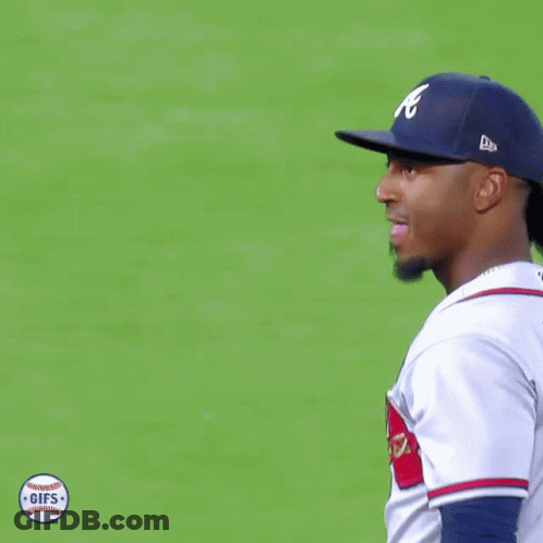 A Baseball Player With A Ponytail On His Head GIF