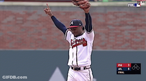 A Baseball Player With The Letter A On His Hat Throws A Ball GIF