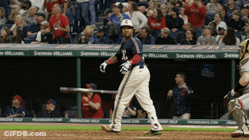 A Baseball Player With The Letter C On His Jersey Stands At Home Plate GIF