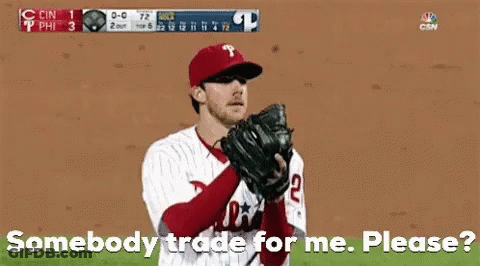 A Baseball Player With The Letter P On His Hat And Glove GIF