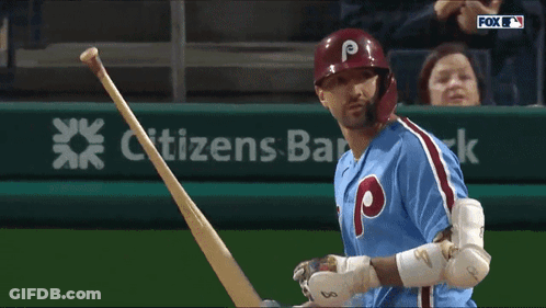 A Baseball Player With The Letter P On His Helmet Holds His Bat GIF