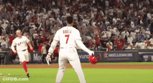 A Baseball Player With The Name Adelz On The Back Of His Jersey GIF