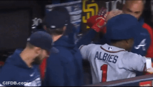 A Baseball Player With The Name Albies On Their Jersey GIF