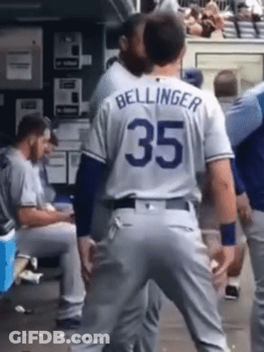 A Baseball Player With The Name Bellinger On His Back GIF