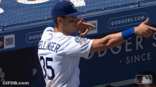 A Baseball Player With The Name Bellinger On His Back GIF
