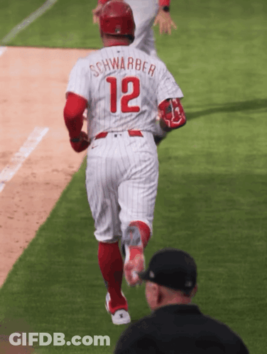 A Baseball Player With The Name Schwarber And The Number 12 GIF