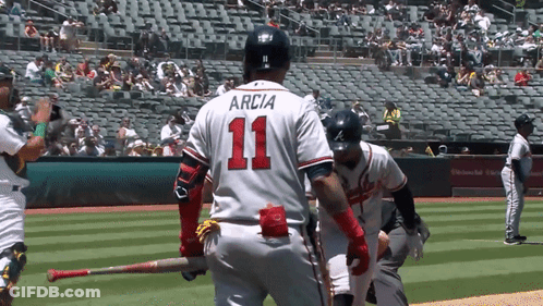A Baseball Player With The Number 11 On His Jersey GIF