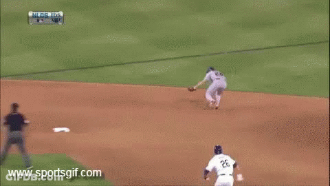 A Baseball Player With The Number 11 On His Jersey Runs To Base GIF