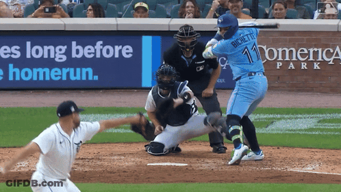 A Baseball Player With The Number 11 On The Back Of His Shirt GIF