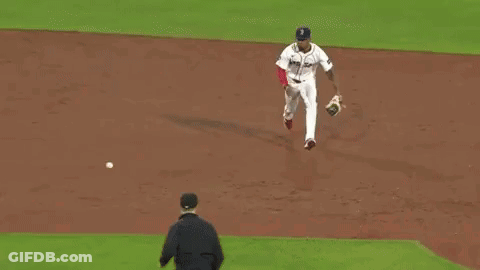 A Baseball Player With The Number 12 On The Back Of His Shirt GIF