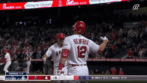 A Baseball Player With The Number 12 On The Back Of His Uniform GIF