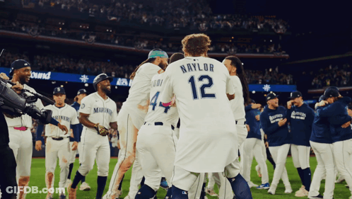A Baseball Player With The Number 12 On Their Back GIF