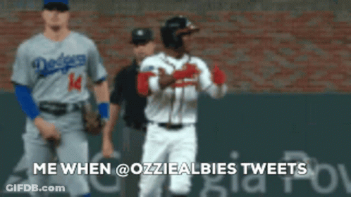 A Baseball Player With The Number 14 On His Jersey Is Talking To Another Player GIF