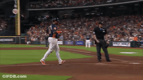 A Baseball Player With The Number 15 On His Jersey Is Walking On The Field GIF