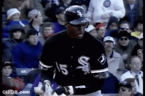 A Baseball Player With The Number 15 On His Jersey Stands In Front Of A Crowd GIF