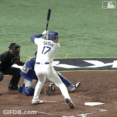 A Baseball Player With The Number 17 On His Jersey GIF