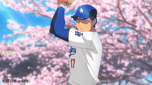 A Baseball Player With The Number 17 On The Back Of His Shirt GIF