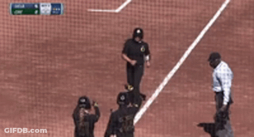 A Baseball Player With The Number 2 On His Back Is Talking To A Referee On The Field GIF